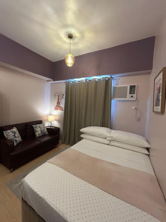 14F Deluxe Unit at Sunvida Tower across SM CITY