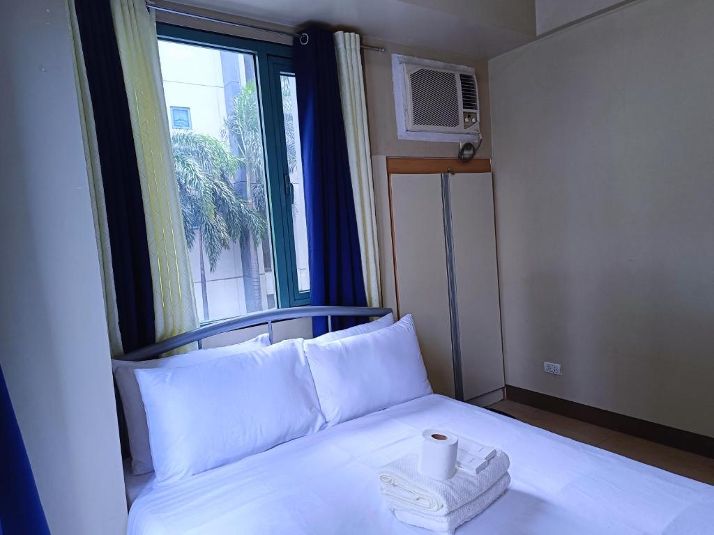 1BR at TWO PALMTREE VILLAS Across Manila airport terminal 3