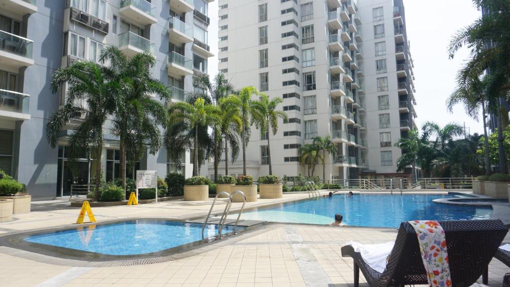 Palm Tree Condos across NAIA3 by Beth