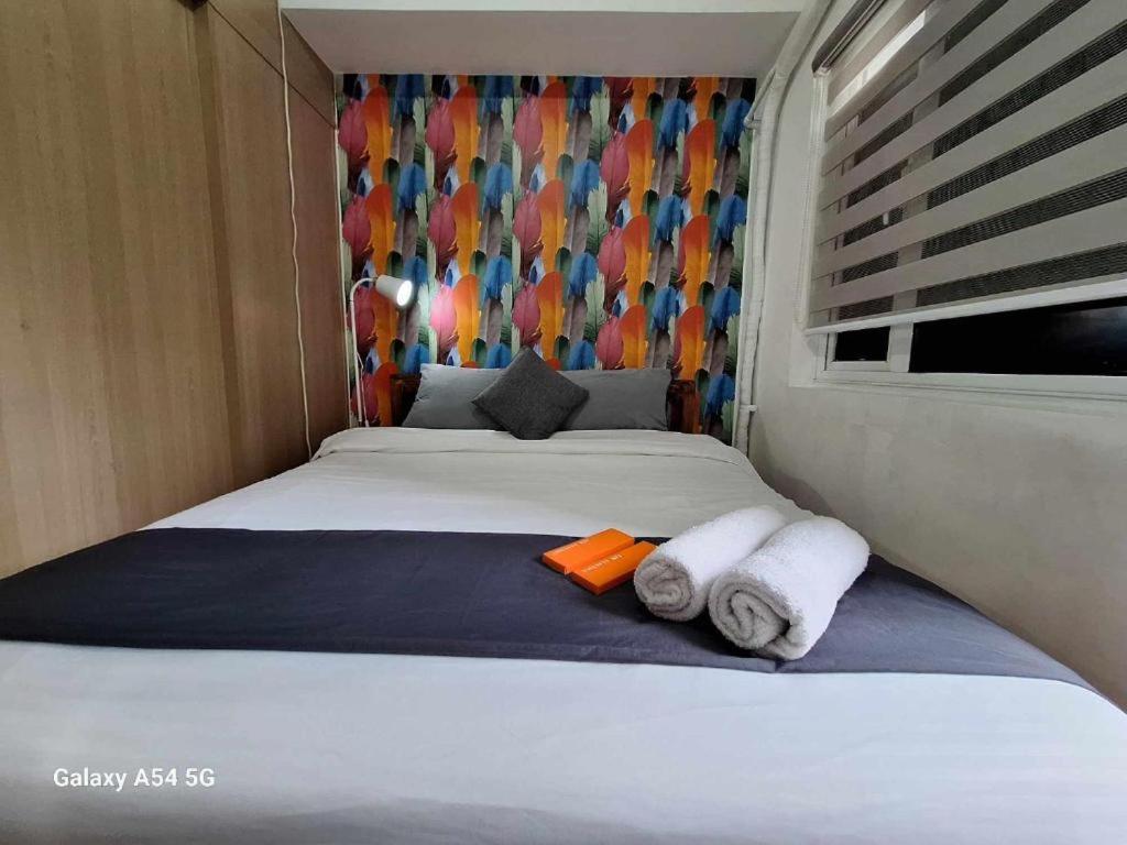 Cozy 1BR with Sofabed and Wifi in Grace Res