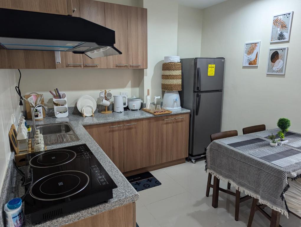 2BR Cozy Condo at Midpoint Residence With Pool