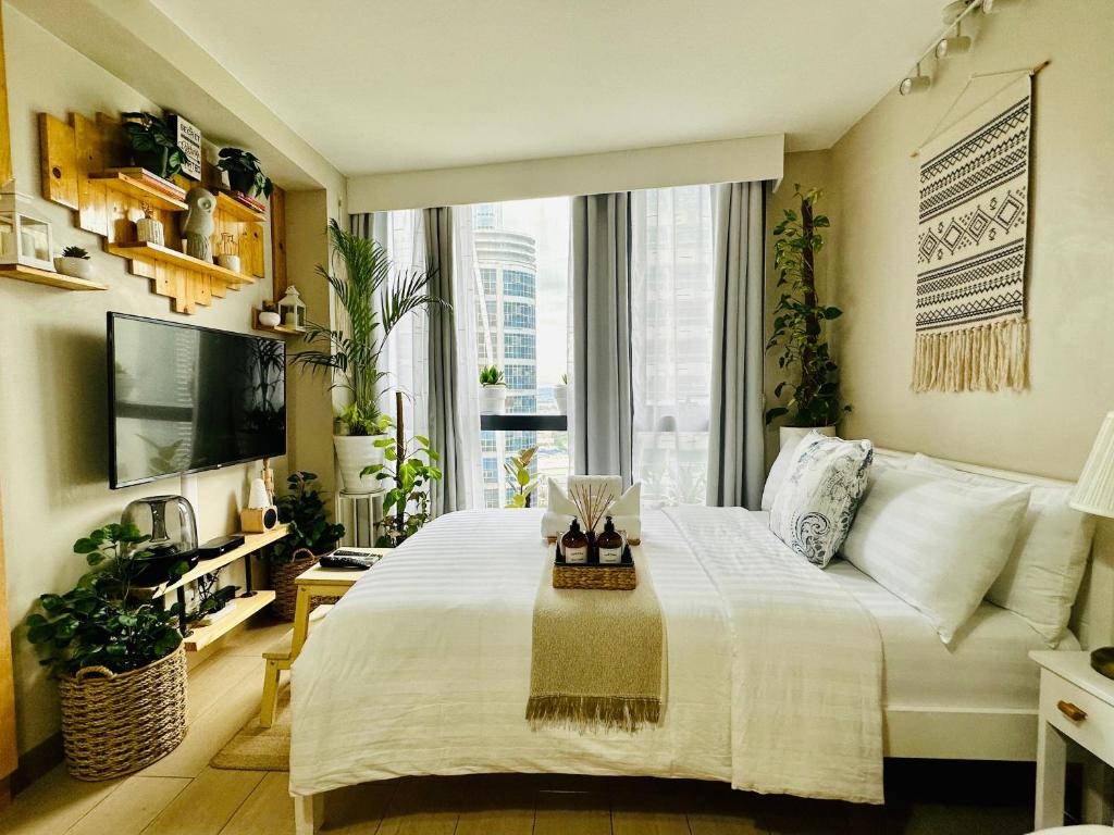 Eastwood City Staycation Oasis by Khen's Crib