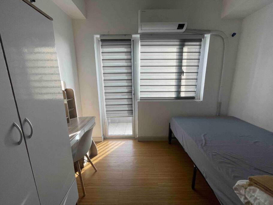 Grace Residences 1 bedroom Fast Wi-Fi Near BGC and Mckinley 2110