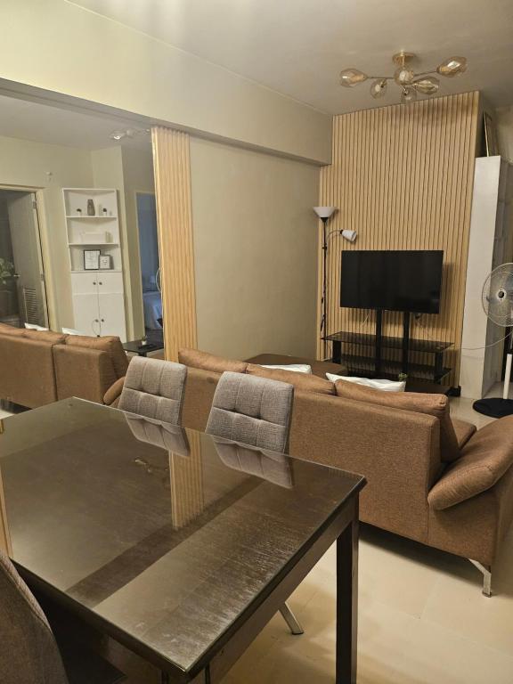 Zinnia Tower 2br condo with QC Cityview