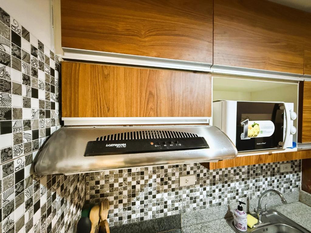 JFam Suites, C311D Studio Condo, 4 Pax - ALL IN!