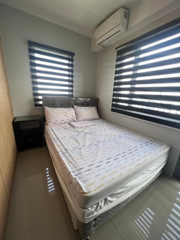 cozy 1 br with netflix and wifi at Grass residences