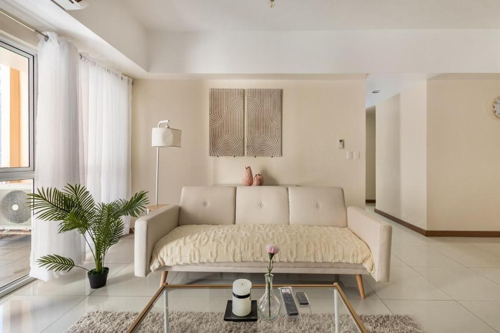 Minimalist Haven 3BR unit at Mckinley Hill