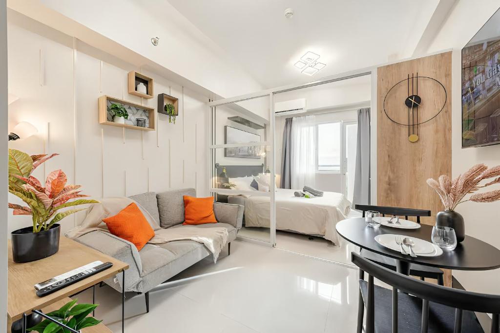 Modern Minimalist Studio with Balcony & Sunset View