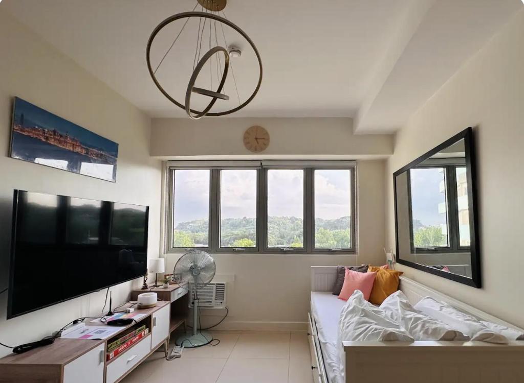 Modern Studio w 55 inches 4K Smart TV, Pool, and More