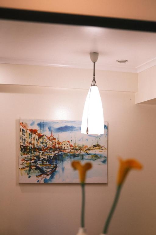 5-mins SM AURA COZY 2BR Free Parking