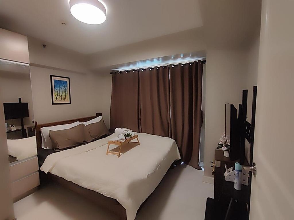 Staycation with Balcony City and River view