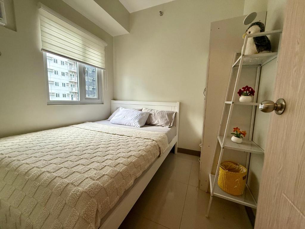 Urban Oasis 2BR Condo with Multiple Pools at SMDC Charm Residences